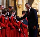 Barack Obama greets members of the choir at Westminster Abbey