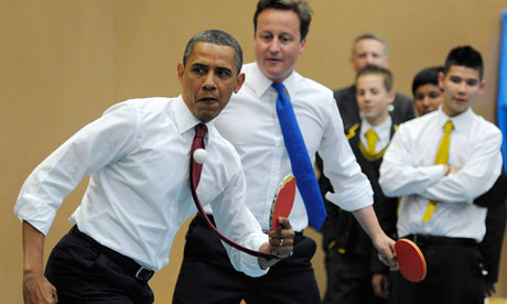 Barack Obama and David Cameron play table tennis at Globe Academy, London, on 24 May 2011.