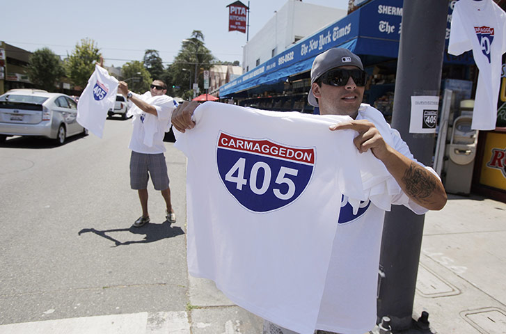 Carmageddon: Men sell T-shirts near Interstate 405 in Los Angeles