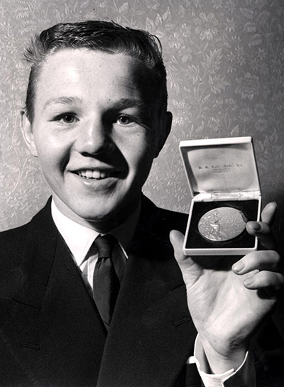 Olympic medals: British flyweight boxer Terry Spinks holds his 1956 Olympic gold medal 