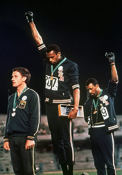 Olympic medals: 1968-Tommie Smith & John Carlos raise a gloved hand in a Black Power salute