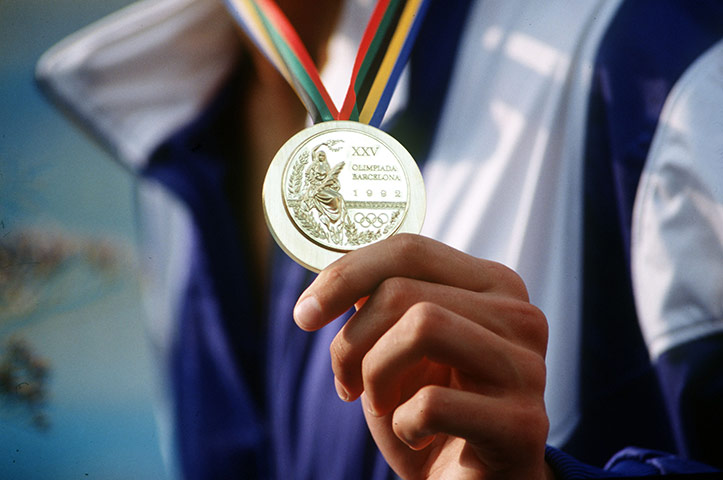 Olympic medals: Close up of the 1992 Olympic gold medal held in Barcelona