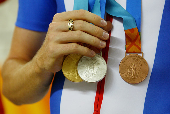 Olympic medals: 2004 Bradley Wiggins with his gold, silver and bronze medals
