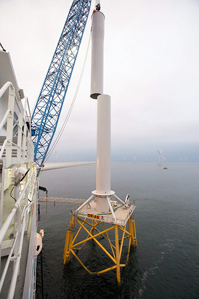 Ormonde wind farm: The second tower section is lowered into place onto the first tower section