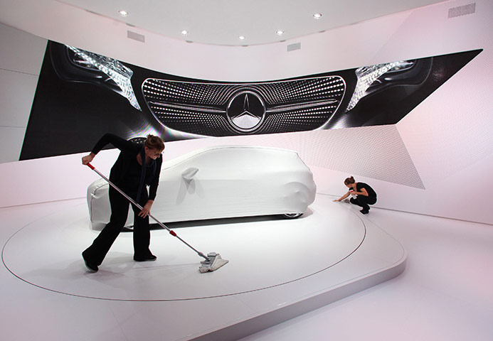 Frankfurt motor show: Workers for German car manufacturer Mercedes-Benz clean their stand
