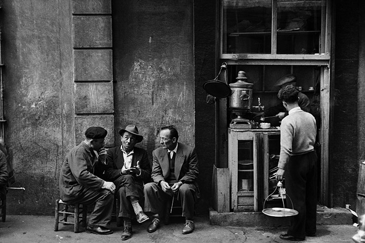 Vintage Istanbul: 1958, People sitting talking beside a coffee bar in a Beyoglu arcade