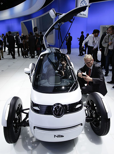 Frankfurt motor show: Visitors look at the Nils Volkswagen concept car 