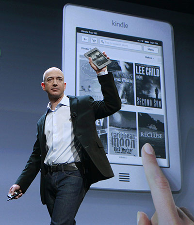 Kindle Fire: Amazon CEO Jeff Bezos holds up the new Kindle Touch