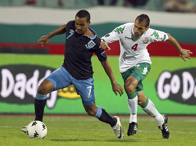 Bulgaria v England: England's Theo Walcott goes past Bulgaria's Petar Zanev