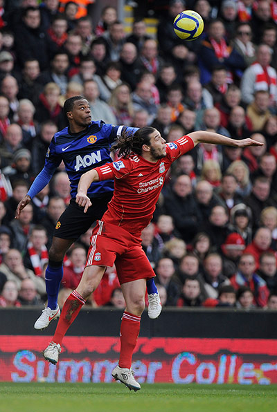 Liverpool v Man Utd: Evra climbs above Carroll