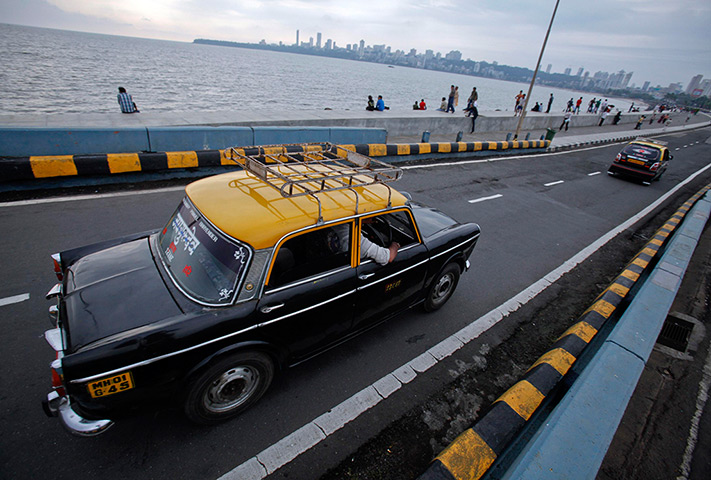Mumbai taxis: Premier Padmini taxi travels along Marine Drive in Mumbai
