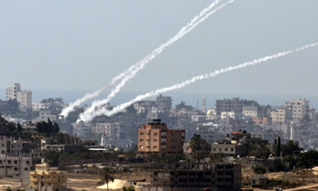 Rockets are launched from the Gaza Strip towards southern Israel on Wednesday. The rocket fire stopped overnight. Photograph: Jack Guez/AFP/Getty Images 