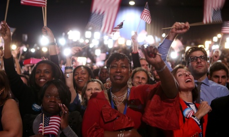 Supporters cheer as President Barack Obama delivers his rousing victory speech.