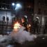 Greek protesters clash with riot police â€“ in pictures