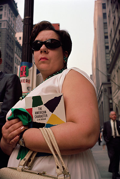 Joel Meyerowitz Monograph: A colour shot of woman from sixties from waist level
