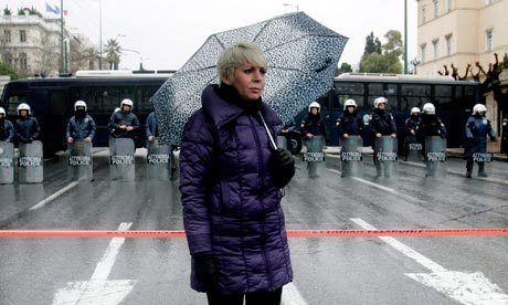 A demonstrator outside the Parliament in Athens