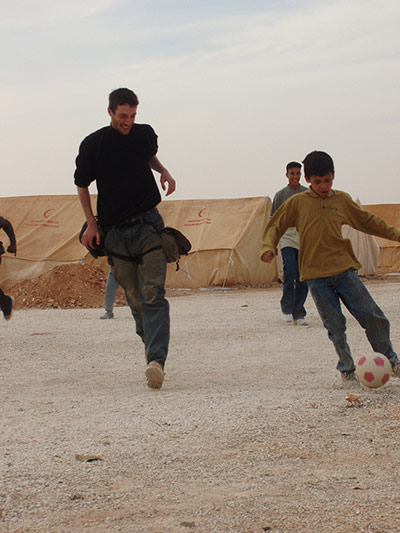 Tom Hurndall : Tom plays football with children