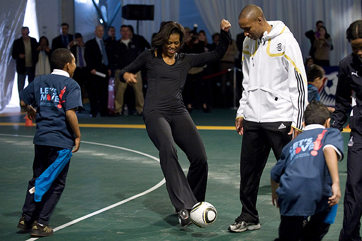 Michelle Obama fitness: First Lady Michelle Obama plays soccer at a soccer clinic