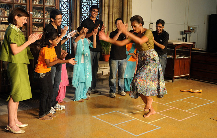 Michelle Obama fitness: First lady Michelle Obama plays hopscotch