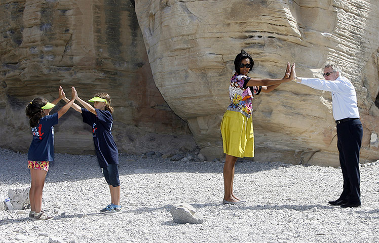 Michelle Obama fitness: Michelle Obama, Harry Reid, stretch for the Let's Move Outside program