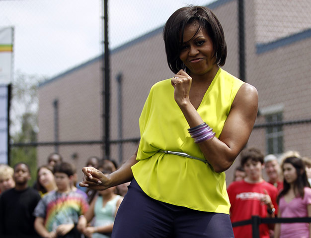 Michelle Obama fitness: First lady Michelle Obama dances during a visit to Alice Deal Middle School