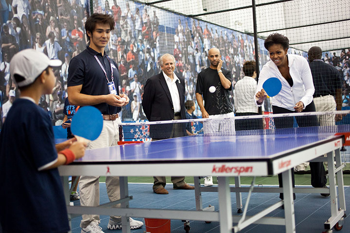 Michelle Obama fitness: First Lady Michelle Obama plays table tennis during a Let's Move! event