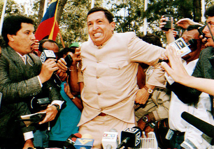Chavez: Chavez talks to reporters after he was released from prison in 1994