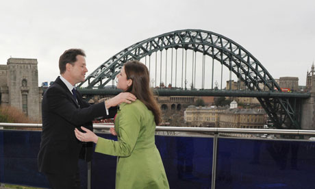 Lib Dem leader Nick Clegg greets MP Jo Swinson in front of the Tyne bridge 