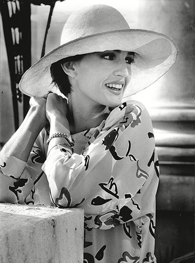 Jaeger: October 1985: Anne Bezamat models yellow print dress and hat
