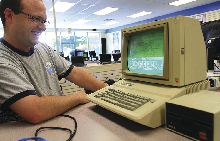 Home computers: An Apple IIE manufactured from 1983 to 1985, with the game Frogger