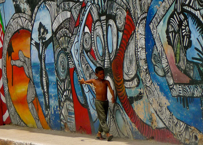 Photo comp April: Kid beating to the sound of rumba music on a Sunday afternoon in Havana. 