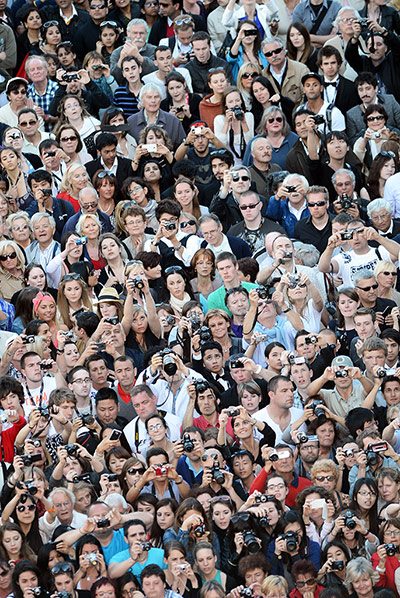 Moonrise: A crowd of spectators snap the celebraties on the red carpet