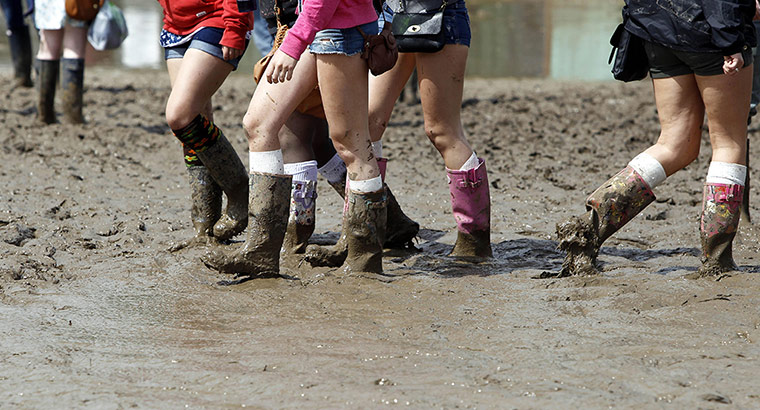Isle of White: Festival goers have come prepared with wellies 