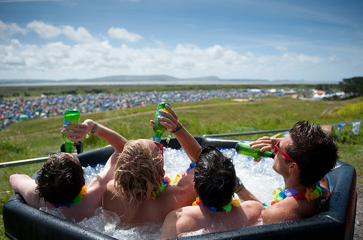 week in music: Festival goers relax in hot tubs at Beach Break Live festival in Carmarthen