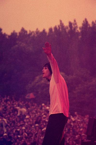 Stone Roses Book: Ian Brown of the Stone Roses performing live at Spike Island, 1990