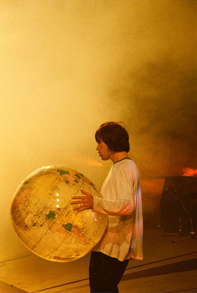 Stone Roses Book: Ian Brown of the Stone Roses performing at Spike Island, 1990
