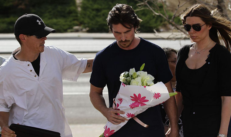 baleaurora: A man greets Christian Bale at the Aurora memorial