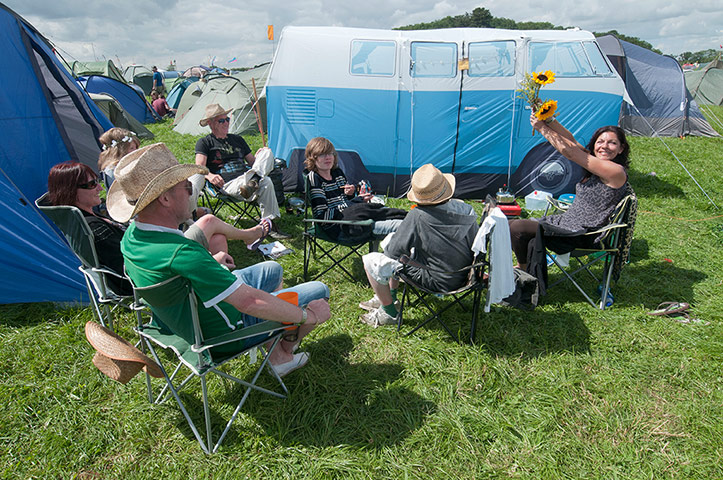 Womad atmosphere: Festival goers relax in the camping area