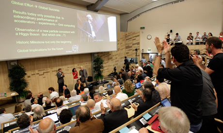 Higgs boson: Participants applaud after the presentation of the Atlas experiments