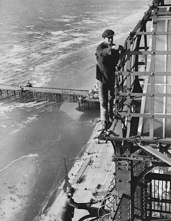 Blackpool illuminations: 1935: Workers fix lamps on Blackpool Tower 