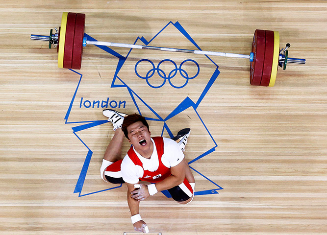 Olympic pain: South Korea's Jaehyouk Sa shouts after getting injured