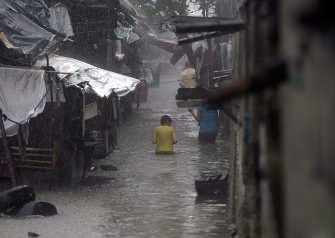 Floods in Manila: Torrential rain and massive flooding in the Philippine capital .