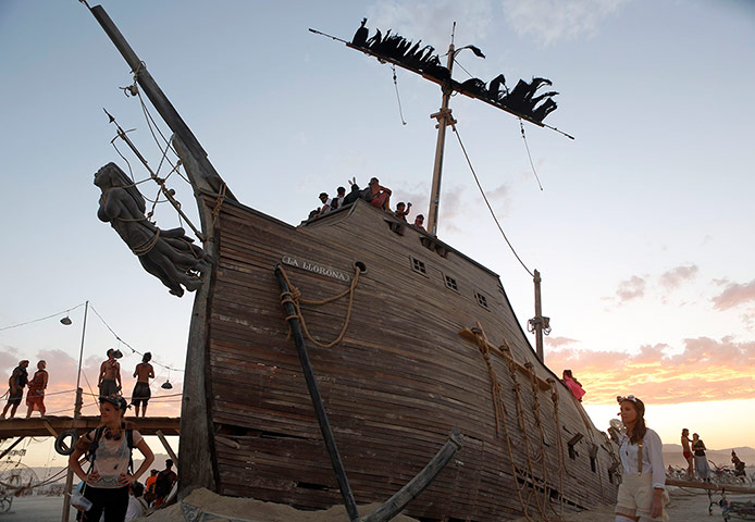 Burning Man: People stand near an art installation entitled La Llorona