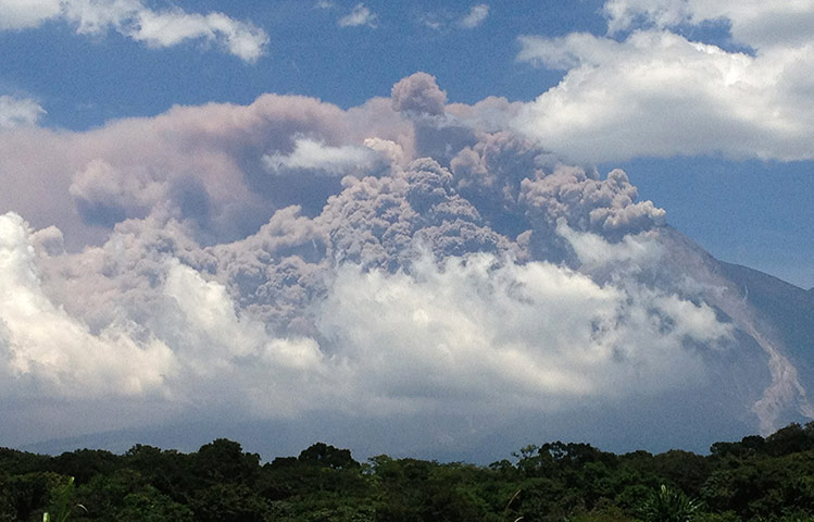 Volcan del Fuego: Plumes of smoke rise from the Volcano
