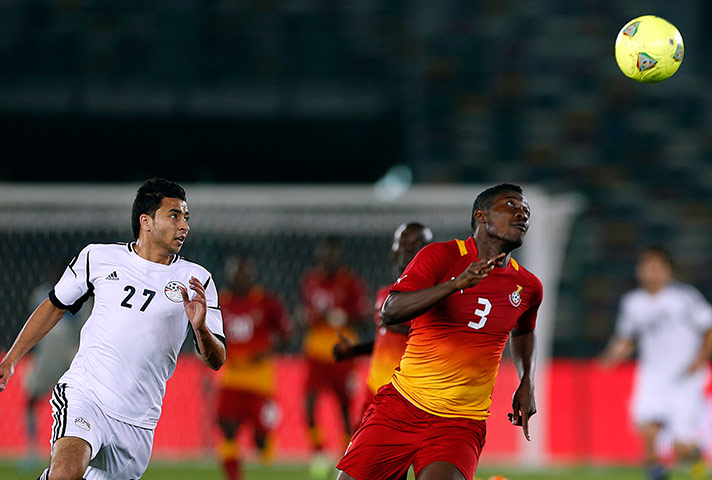 African Nations: Egypt's Basem Ali fights for the ball against Ghana's Asamoah Gyan