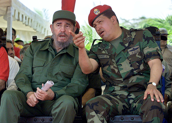 2001: President Hugo Chávez confers with the then Cuban leader, Fidel Castro