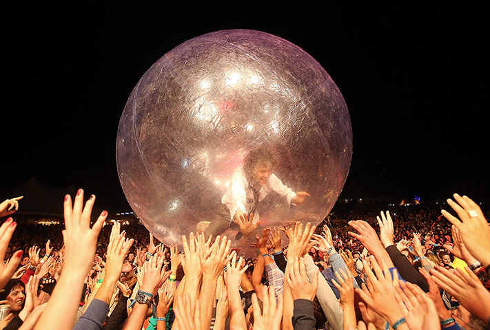 Week in Music: Wayne Coyne of the Flaming Lips crowd surfs at The Falls Music Festival