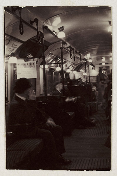 Tube through the decades: Interior of an underground train carriage, London, c 1930