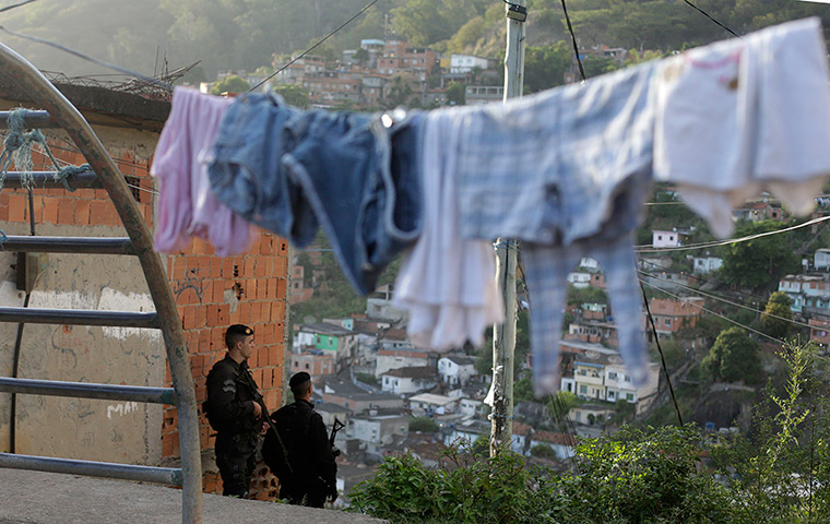 Favela clearance: Police officers patrol at the Arvore Seca slum