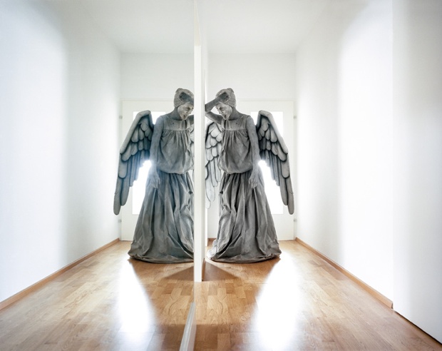 The Weeping Angel. <br/>A fan of Doctor Who dressed as a deadly weeping angel. The statuesque aliens were introduced in the Hugo award-winning episode Blink, and have been voted both the best and scariest monster in several fan polls. The term “weeping” is, however, a misnomer; the aliens do not actually weep, but cover their eyes as if in tears so as to avoid meeting one another’s gaze. The one in this photograph is upset because she’s just been burgled.